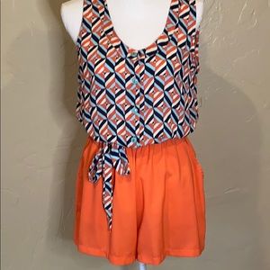 Coral and navy patterned romper